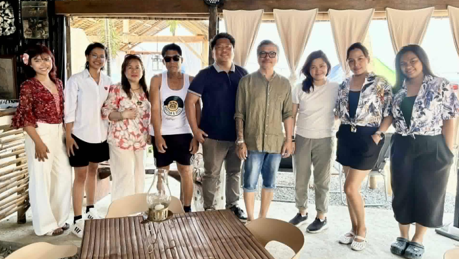 The Rhythm and Reef family and staff on the Anilao coast
