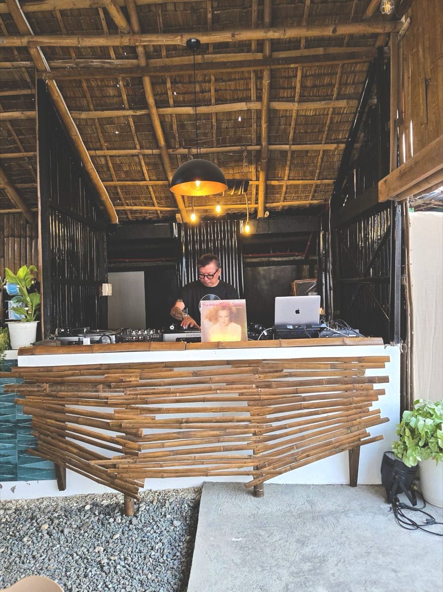 DJ at the Rhythm Deck bar